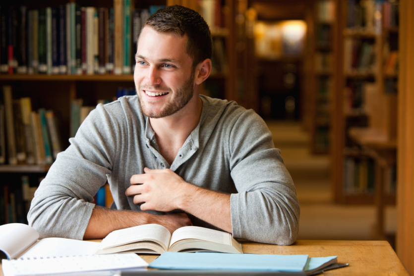 College man in library